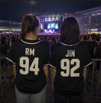 Black BTS baseball jersey front view on model