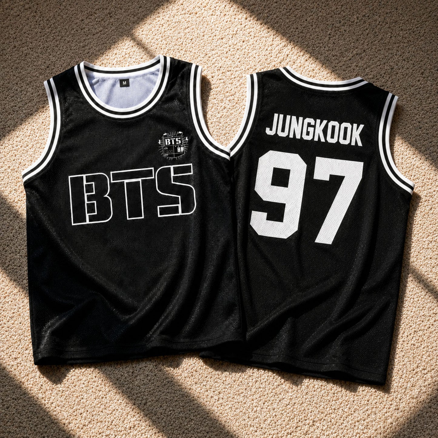 Detail of BTS logo on front of custom basketball jersey