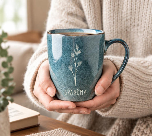 Engraved Grandma Mug, Blue Speckled Ceramic Cup with Botanical Design, Gift for Grandmother — image 1